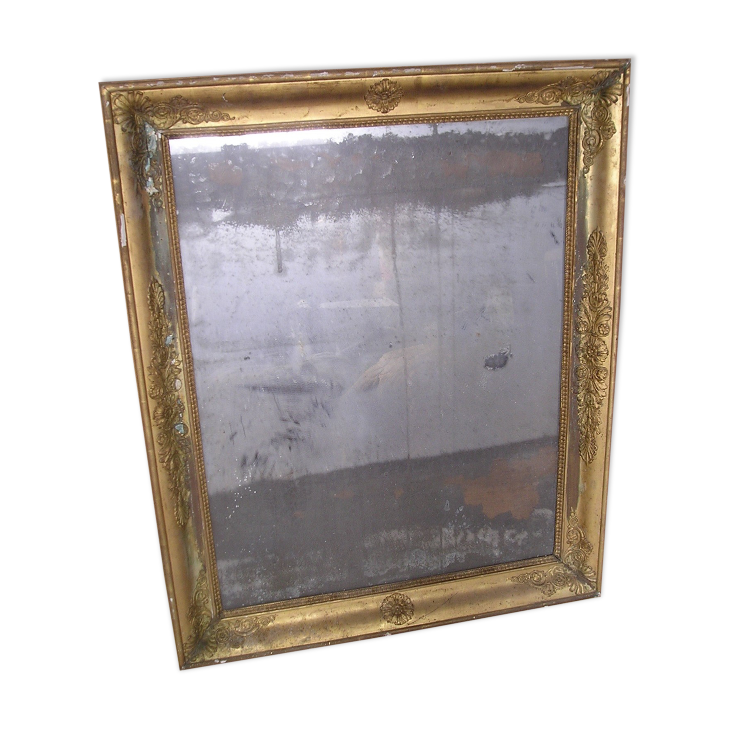 Antique wooden mirror and gilded stucco with gold leaf 89 x 72