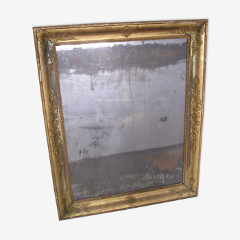 Antique wooden mirror and gilded stucco with gold leaf 89 x 72