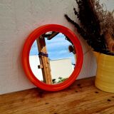 Vintage orange round mirror