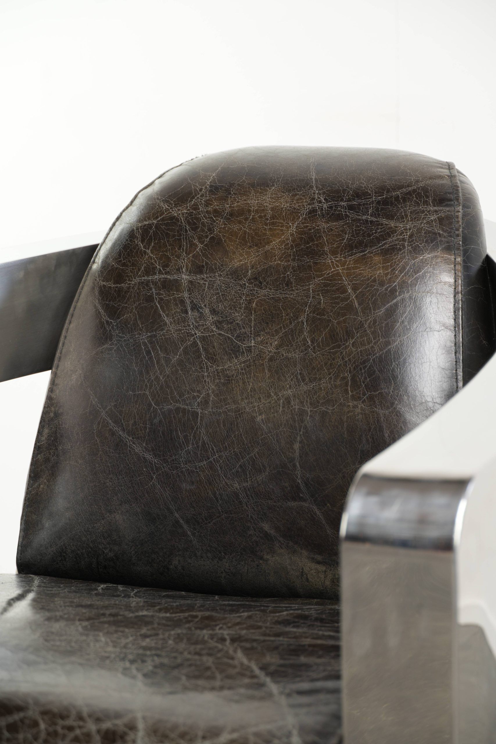 Industrial Aviator design armchair in cowhide finished with aluminium