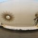 Round beveled amber pink mirror