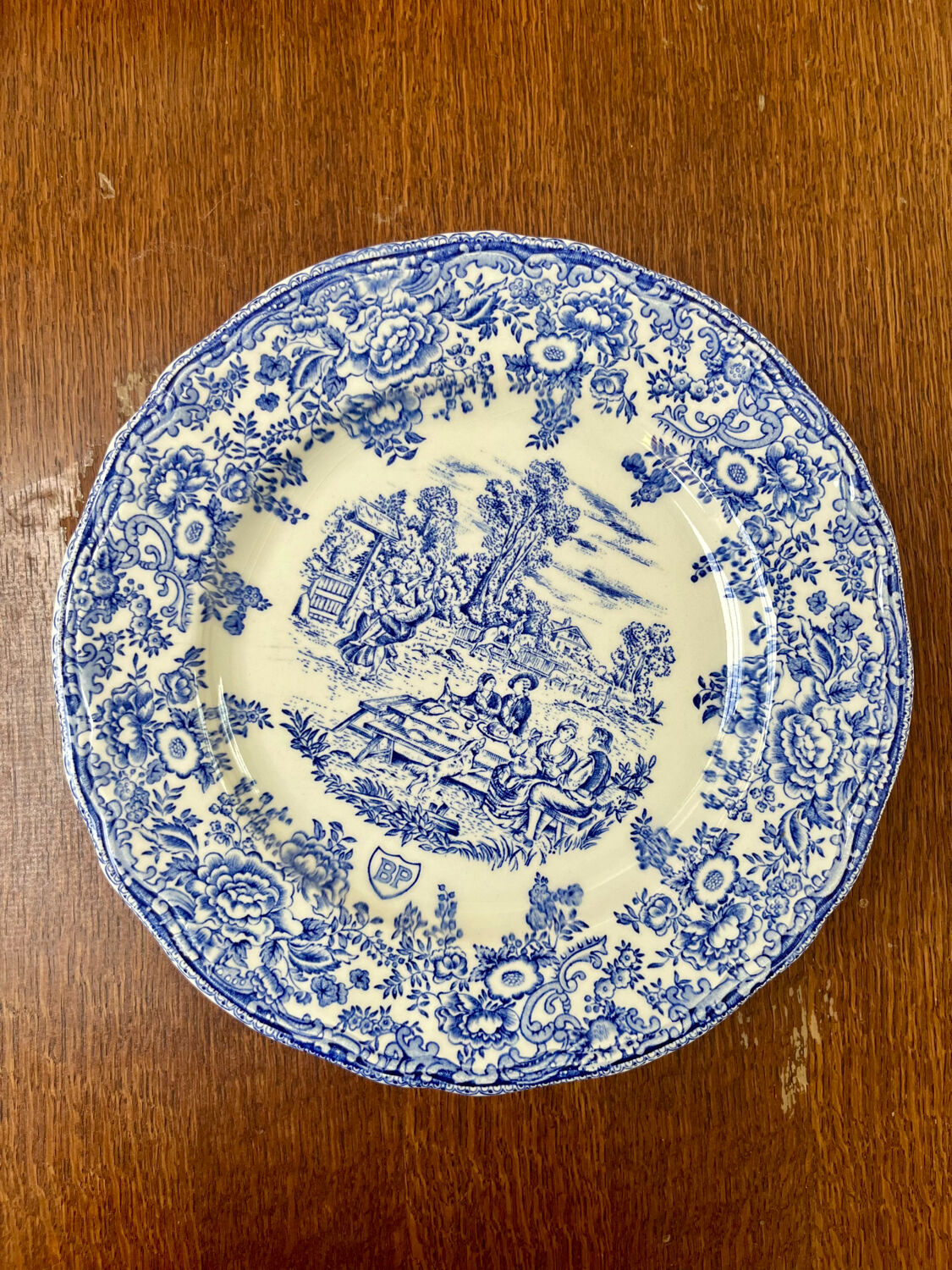 Set of 4 vintage BP blue plates – earthenware decorated with a rural scene