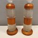 Swedish table lamps made of teak wood and hard pressed crystal glass.