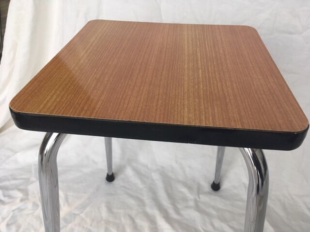 Stool in orange/brown formica