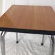 Stool in orange/brown formica