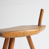 Brutalist tripod stool in carved wood, 1950s