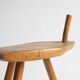 Brutalist tripod stool in carved wood, 1950s