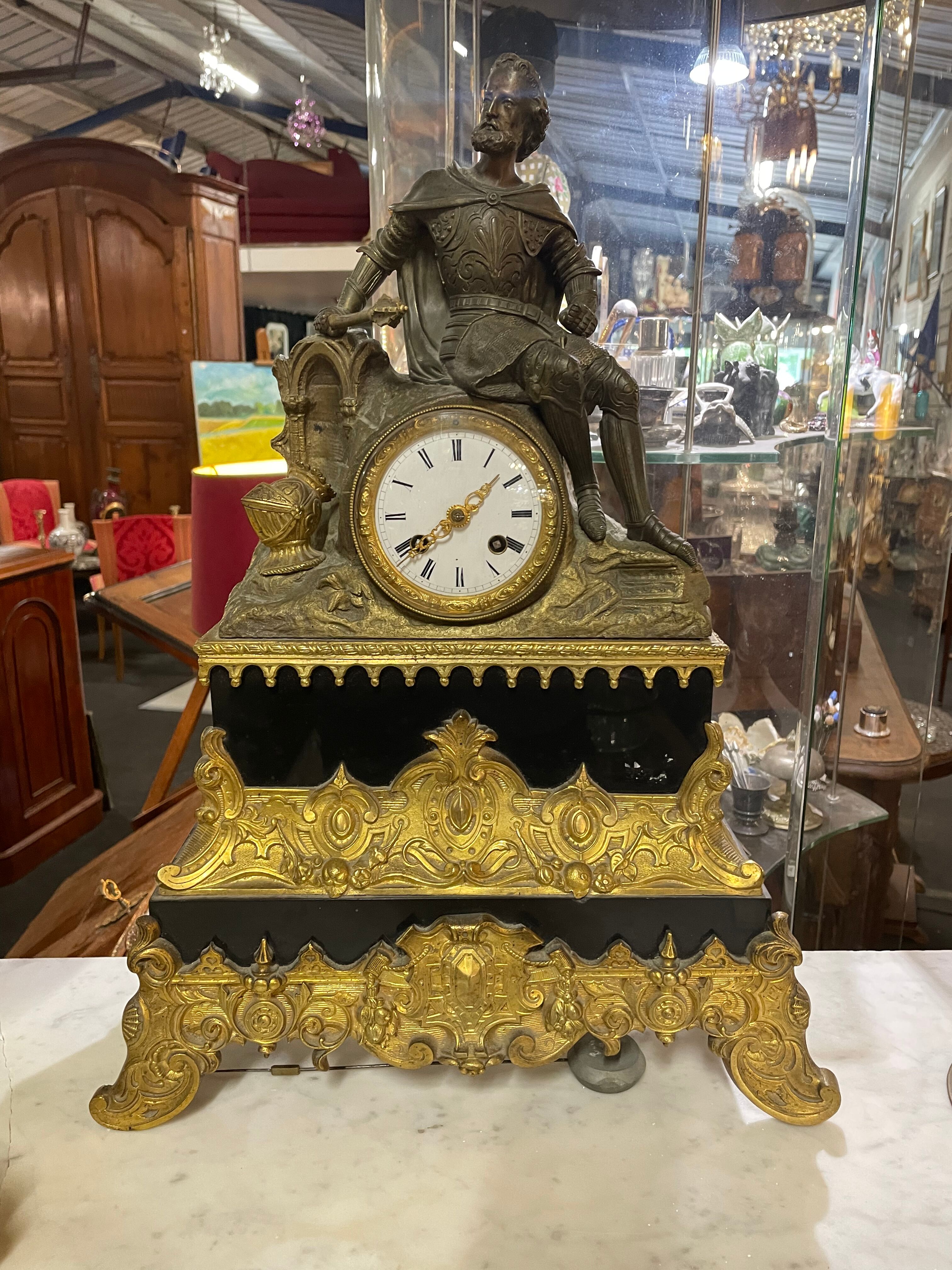 Pendulum in gilded bronze and onyx