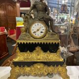 Pendulum in gilded bronze and onyx