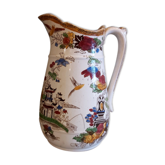 Vintage jug for water with oriental motifs