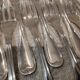 12 silver-plated metal cake forks by Argental silversmiths with a decorative pattern