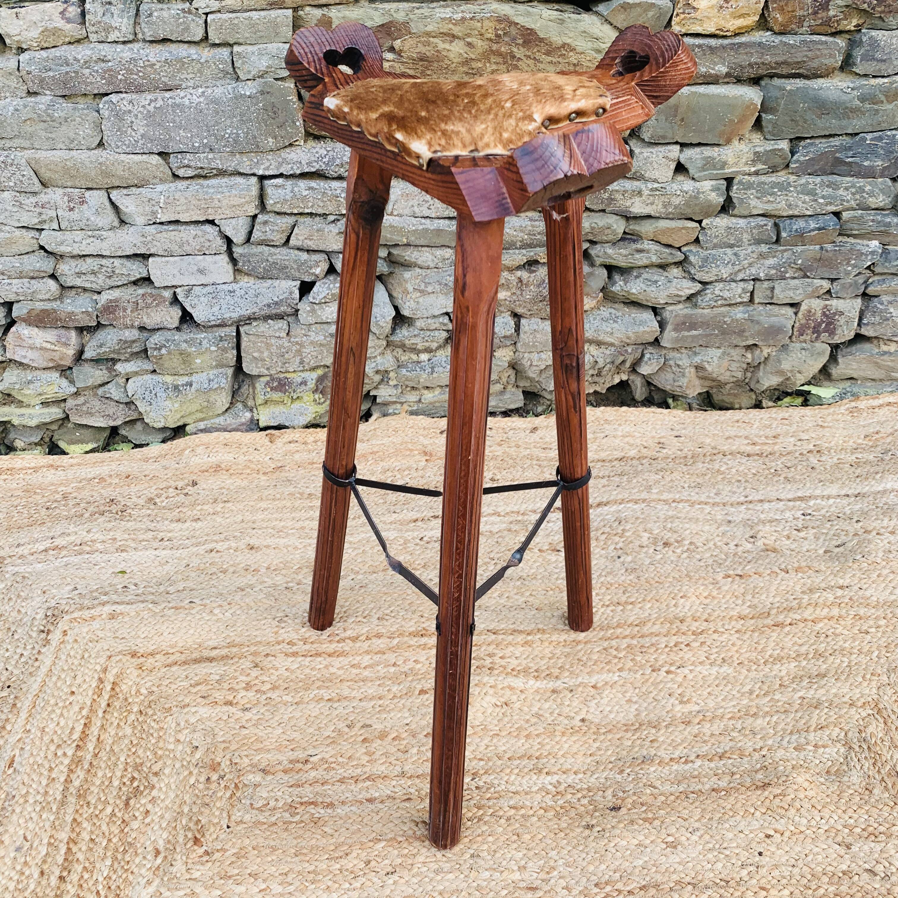 Set of 2 vintage high stools in cowhide and wood
