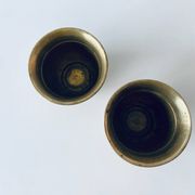Pair of brass cord pot covers