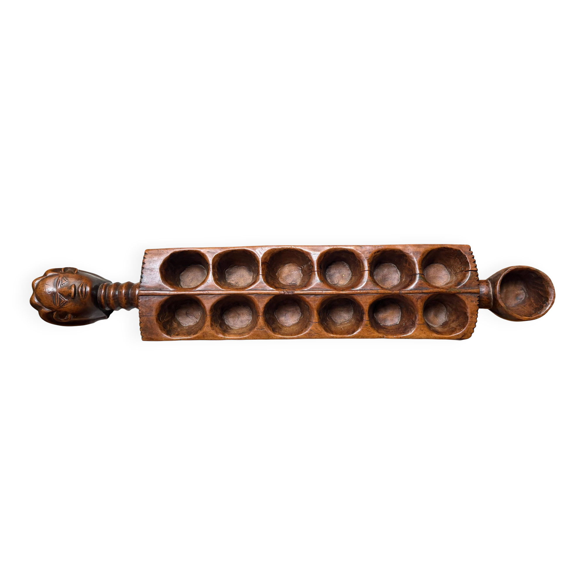 Ancient African Awalé in carved wood – traditional game – Ivory Coast