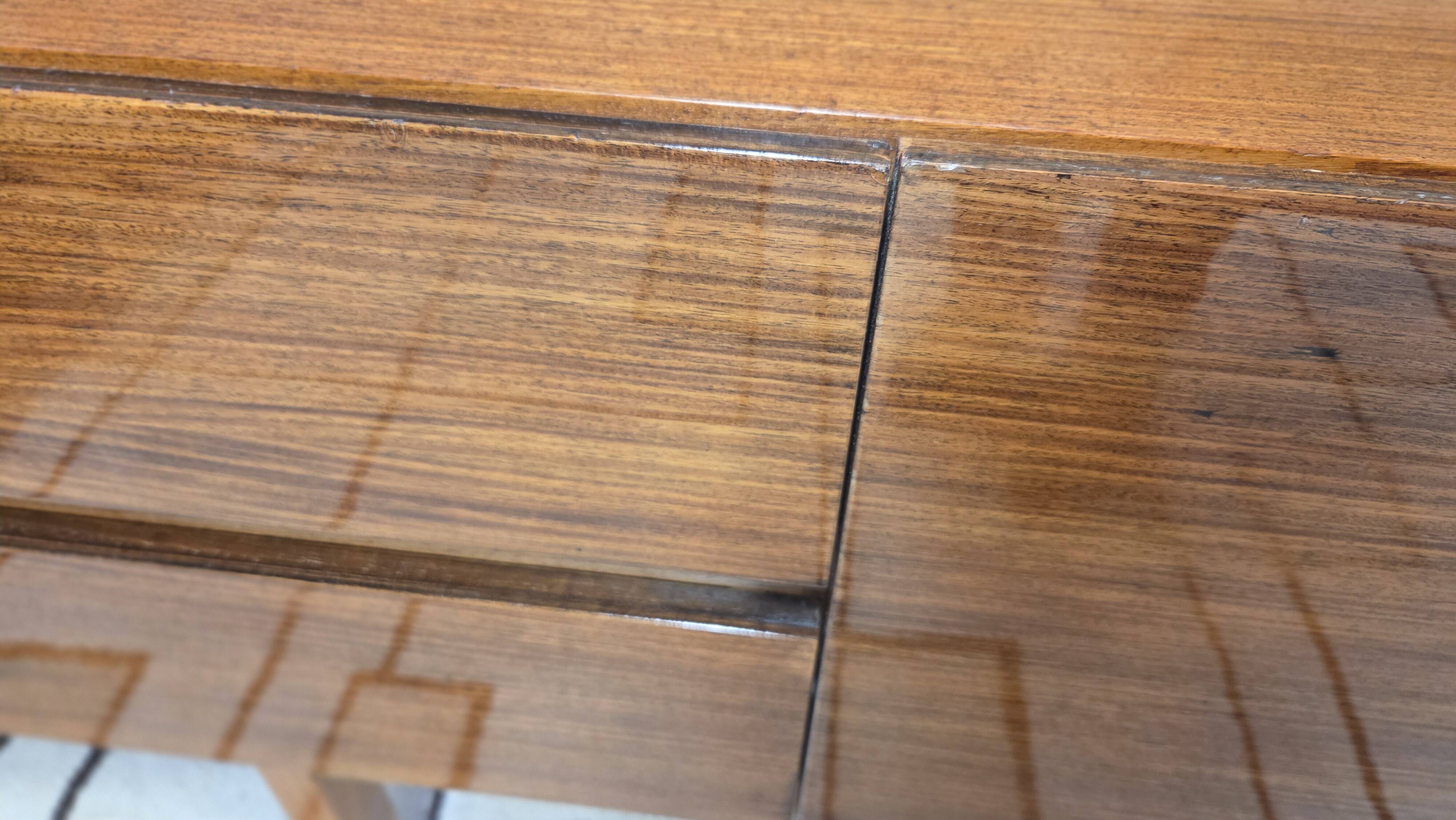 Vintage Scandinavian lowboard in teak – Minimalist sideboard from the 60s/70s.