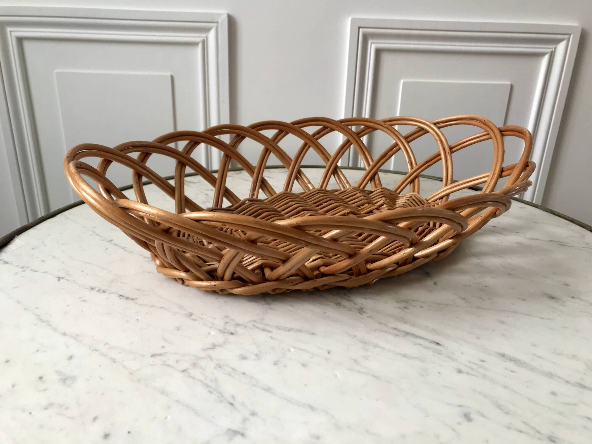 trio of woven rattan and bamboo baskets from the 60s and 70s