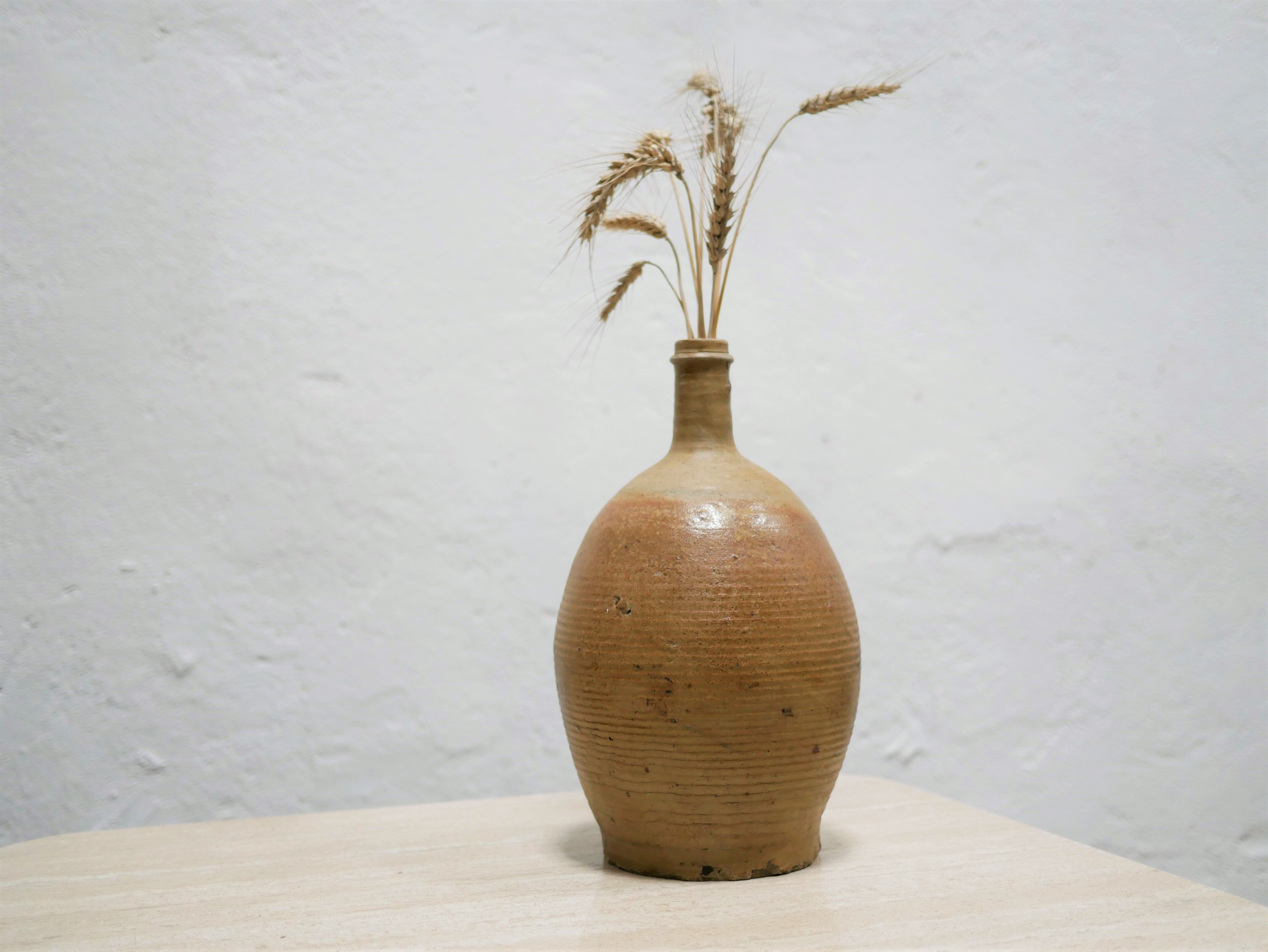 Vintage glazed terracotta jar