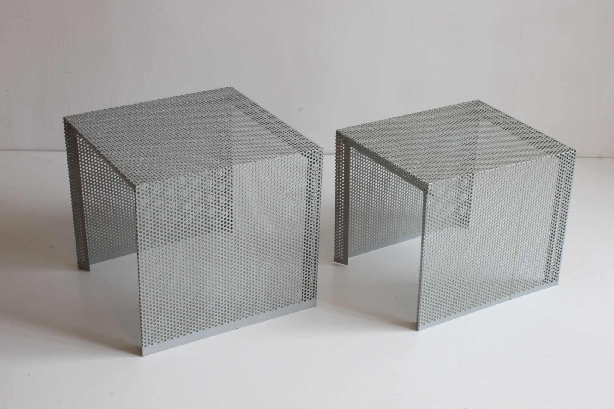 Grey perforated metal nesting side tables, 1990s set of two.