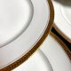 6 flat plates in white and gold Limoges porcelain