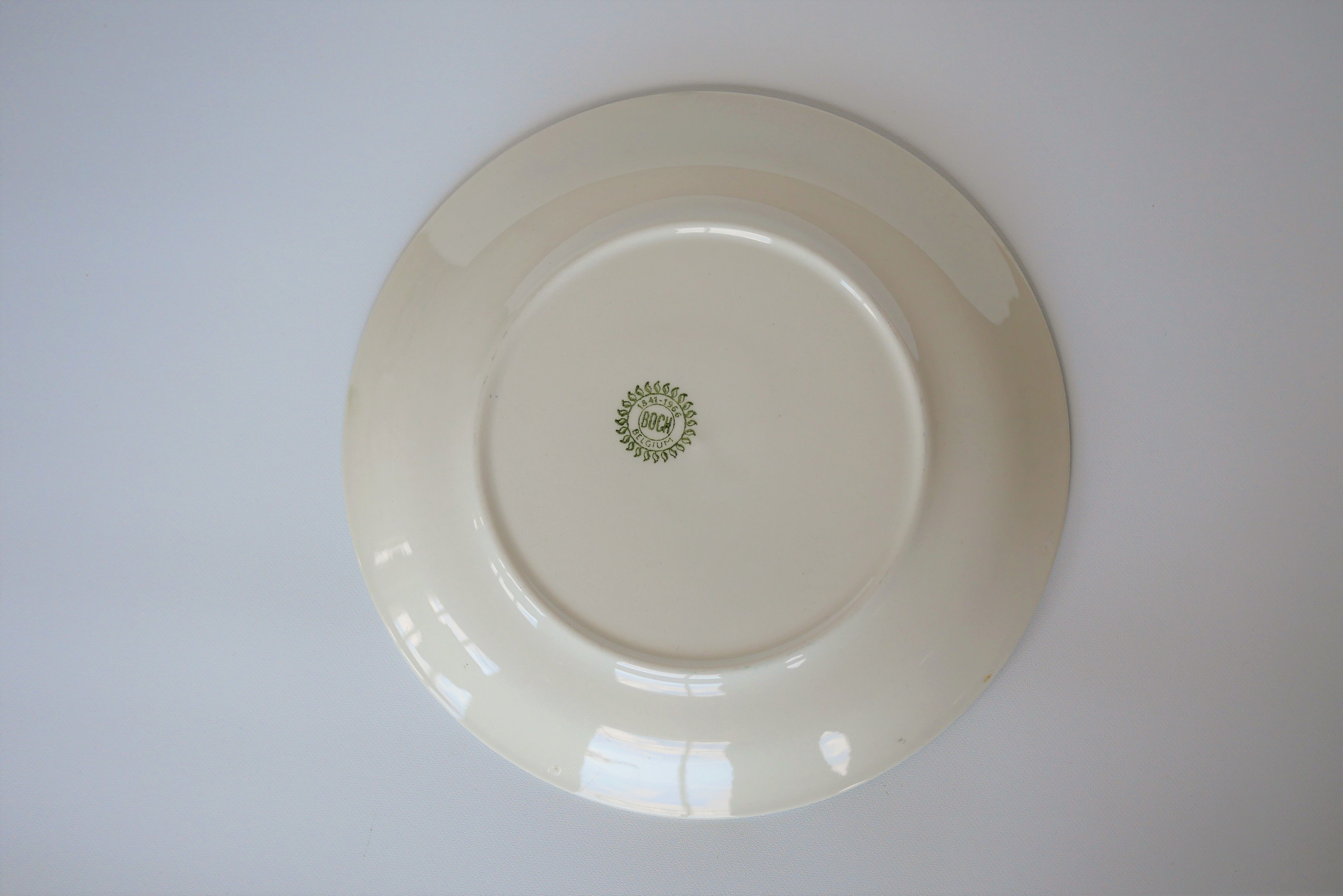 Series of 8 vintage plates edited by Boch La Louvière