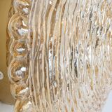 Amber glass wall sconces in the shape of a fingerprint, Germany, 1970s.