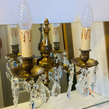 Pair of gilt bronze wall sconces with pendants from the mid-20th century.