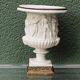 Pair of Medicis Borghese vases in porcelain biscuit and brass.