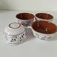 Glazed earthenware cups