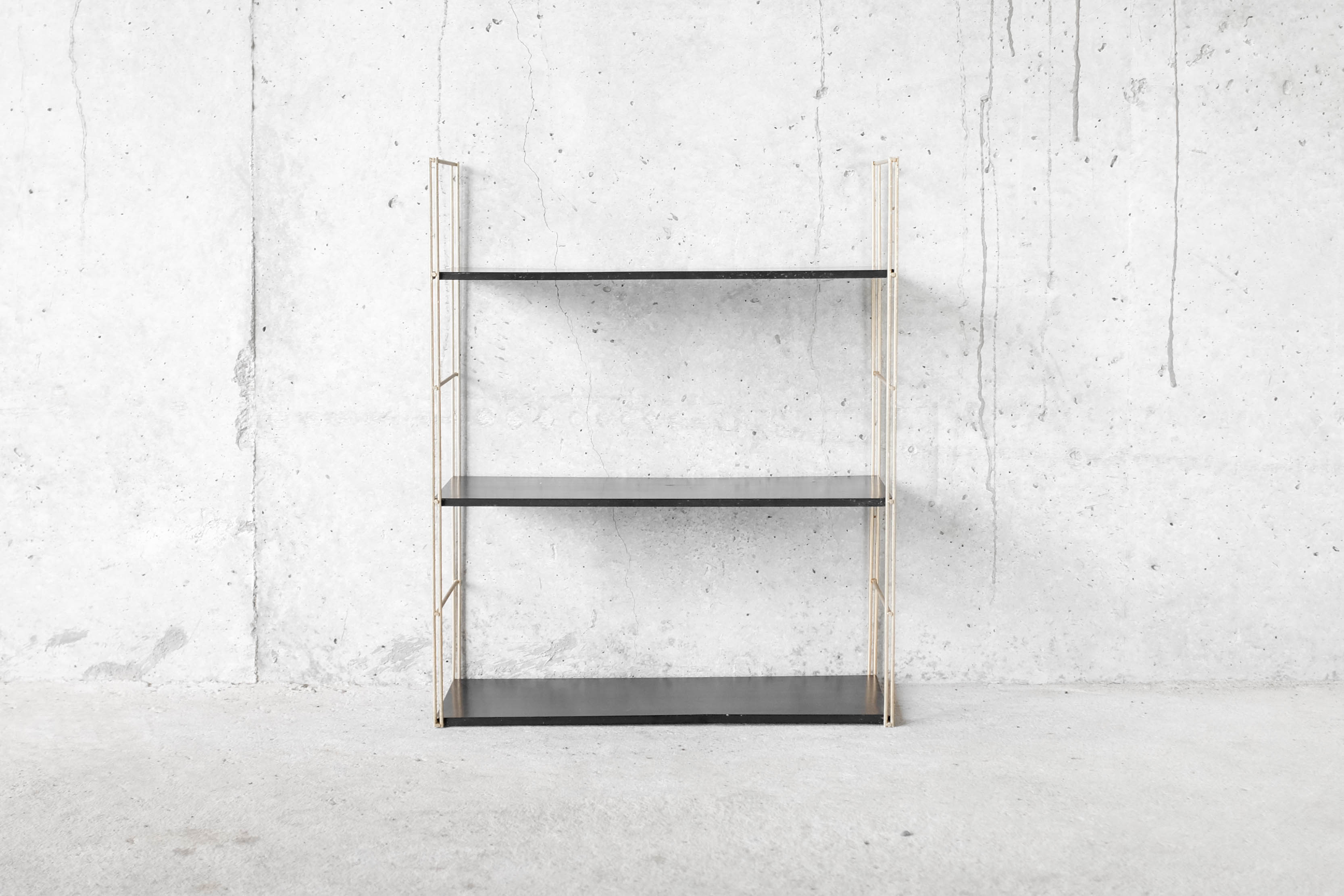 Brass string shelf