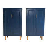 2 blue-painted buffets on legs