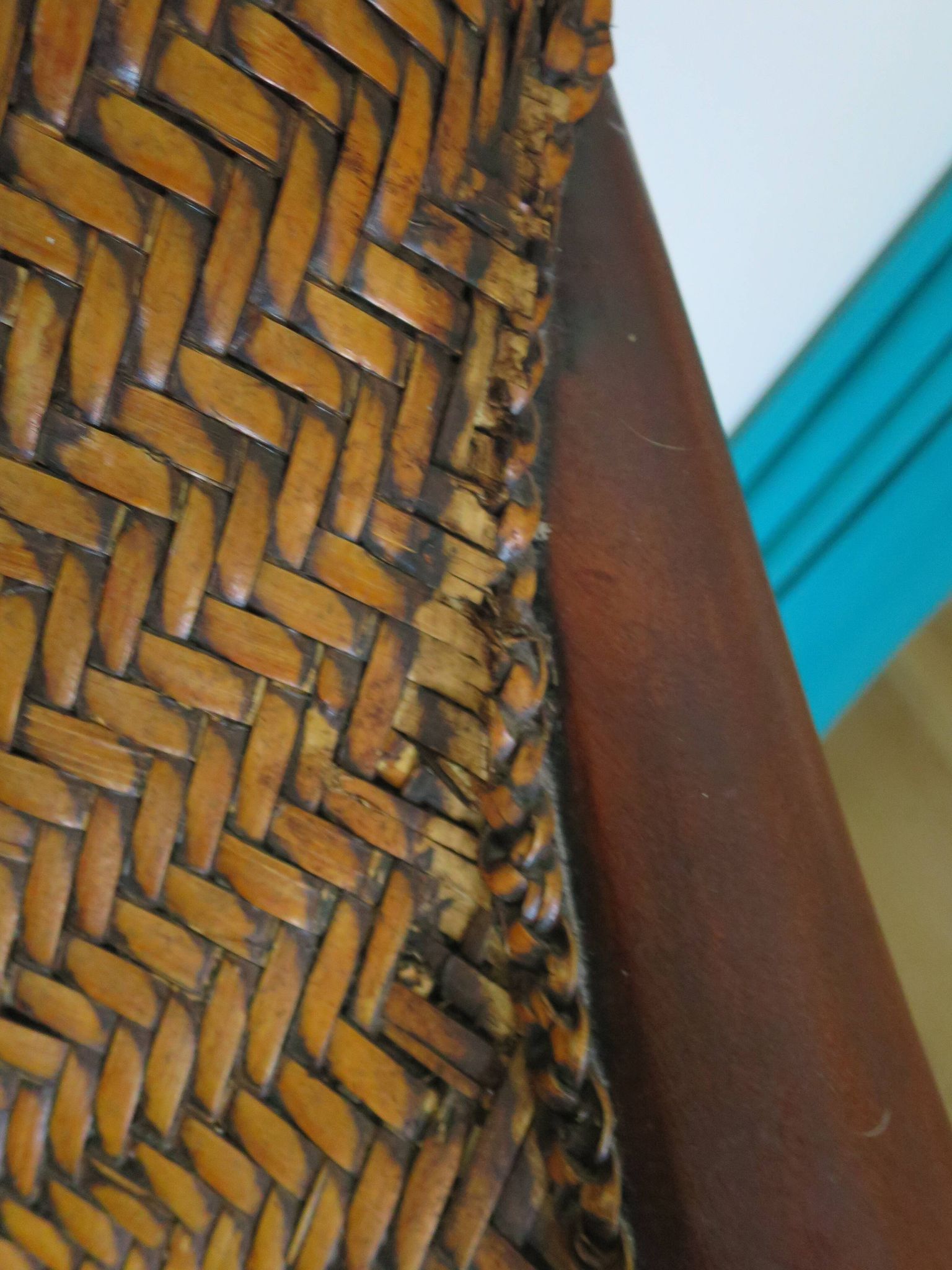 Woven rattan armchair and exotic wood in colonial style, 1980s.