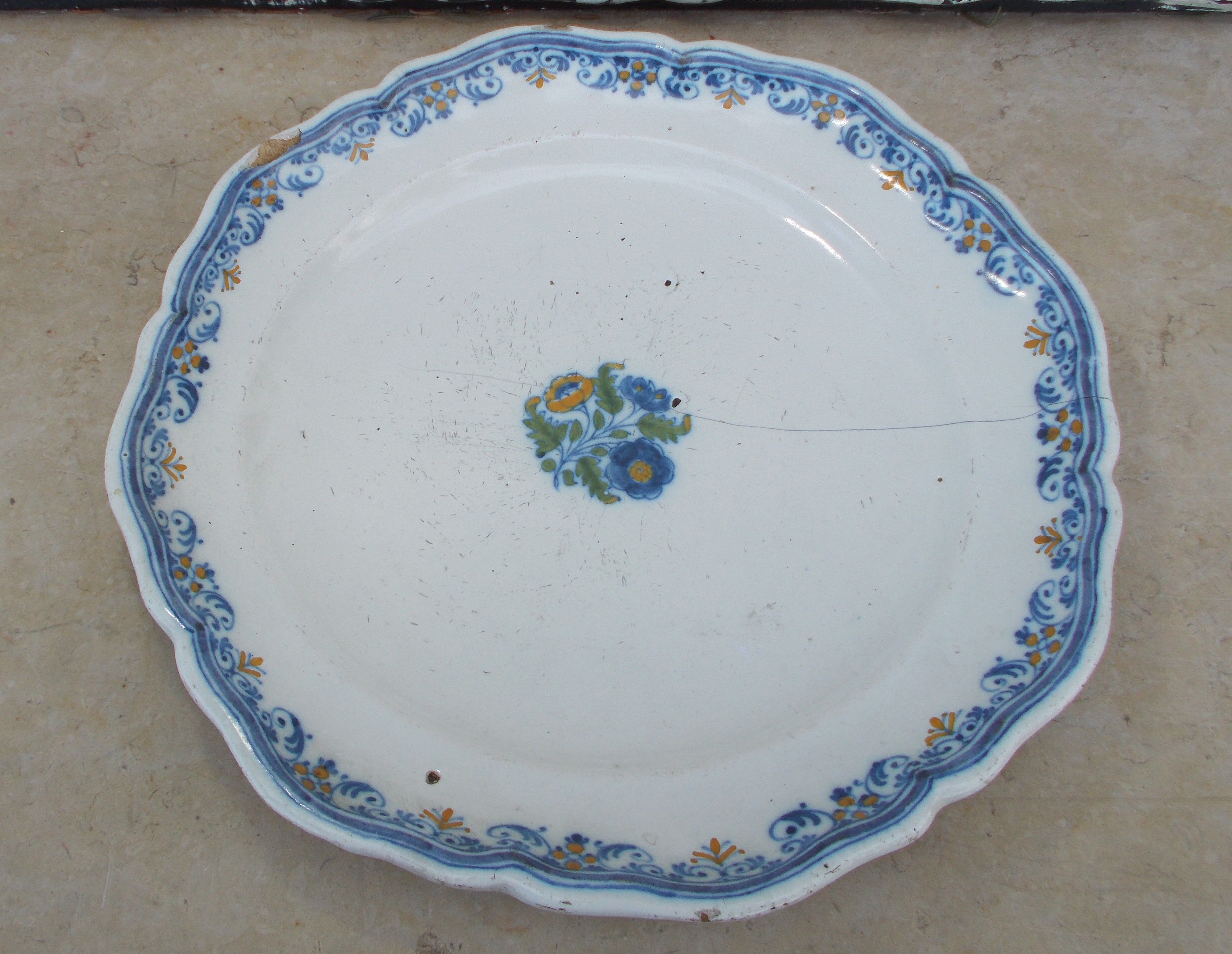 Old faience plate of Moustiers