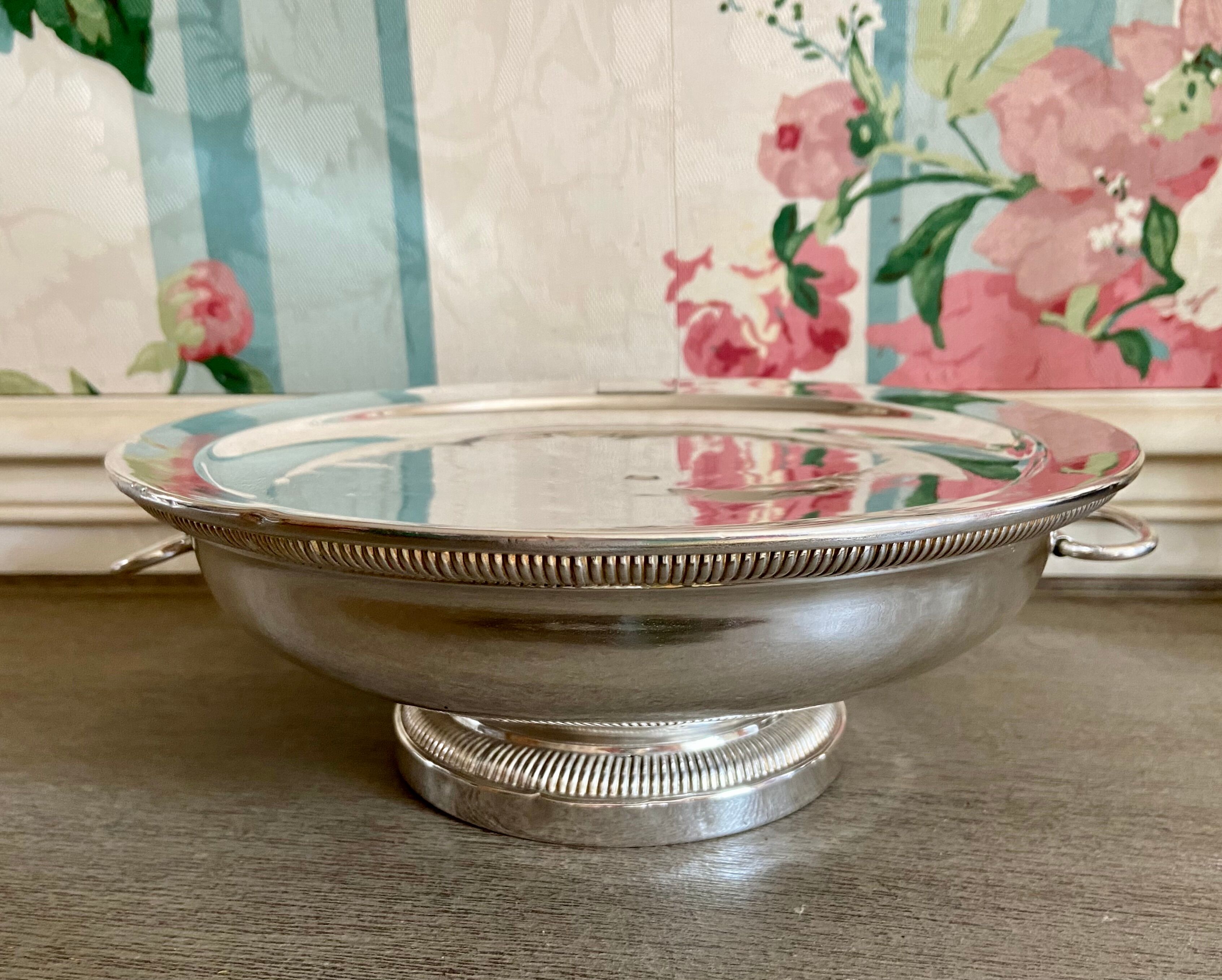 Old silver metal trivet