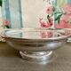 Old silver metal trivet