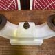 Pair of ceramic and brass office chandeliers
