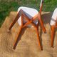 vintage wooden chairs with white faux leather
