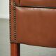 Cowhide club armchair in English style with comfortable seating.
