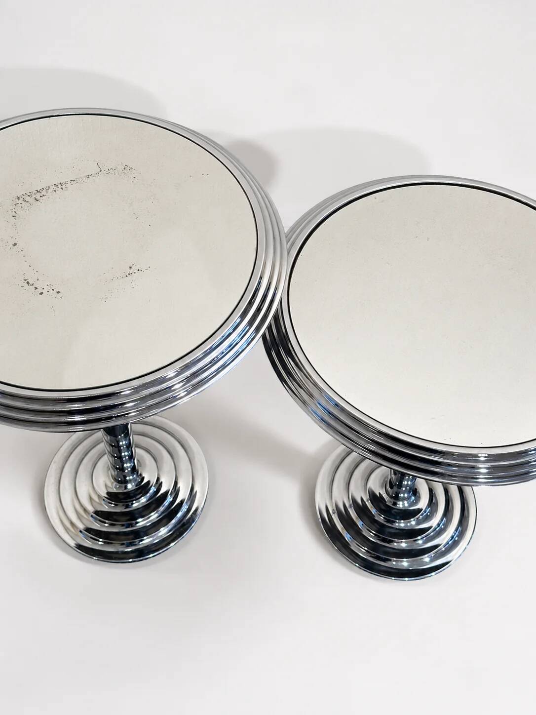Pair of chrome mirrored sidetables, 1980s