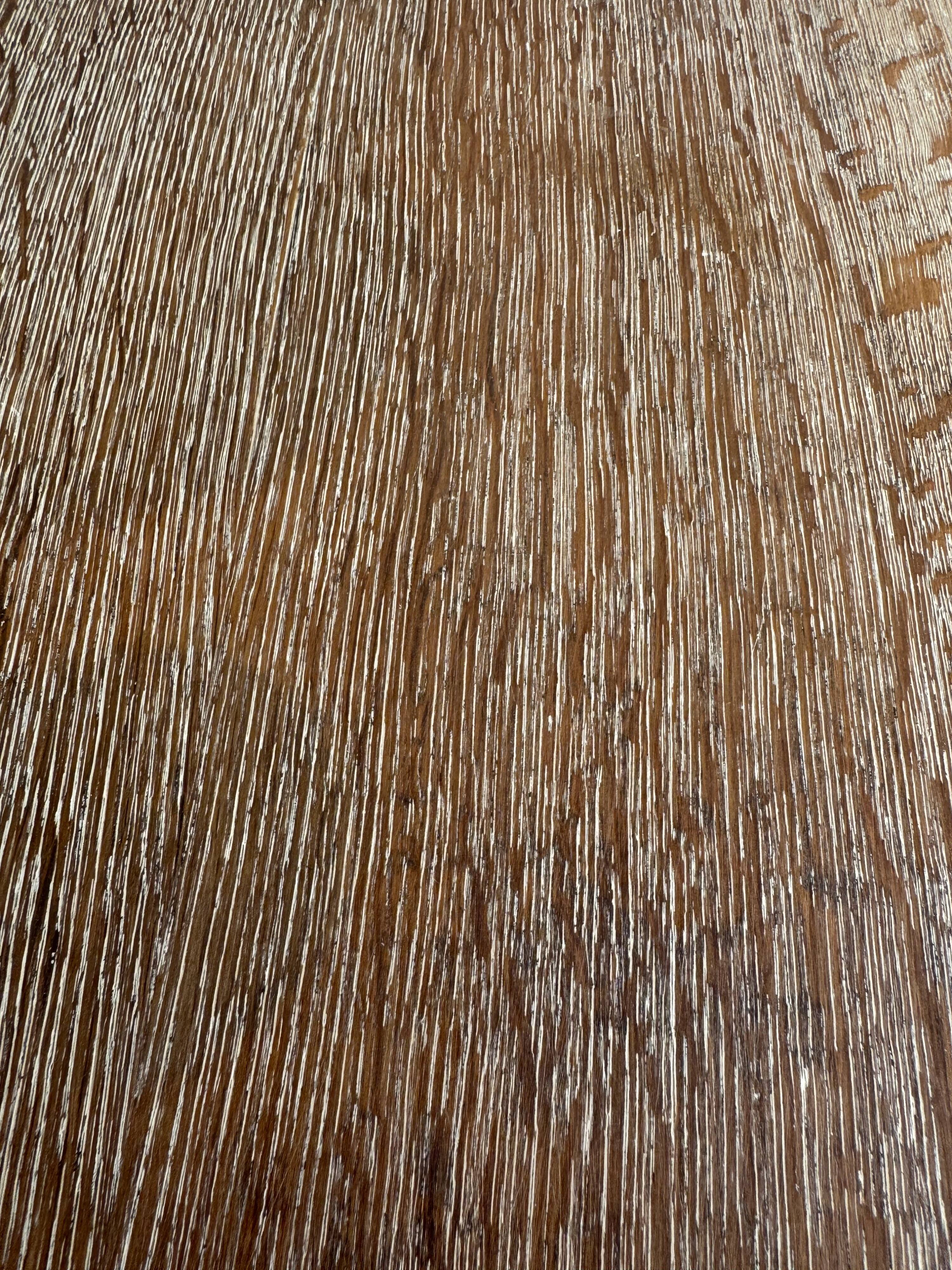 Art Deco round oak side table in light weathered oak with lower shelf, geometric three-leg design