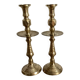 Pair of engraved brass candle holders