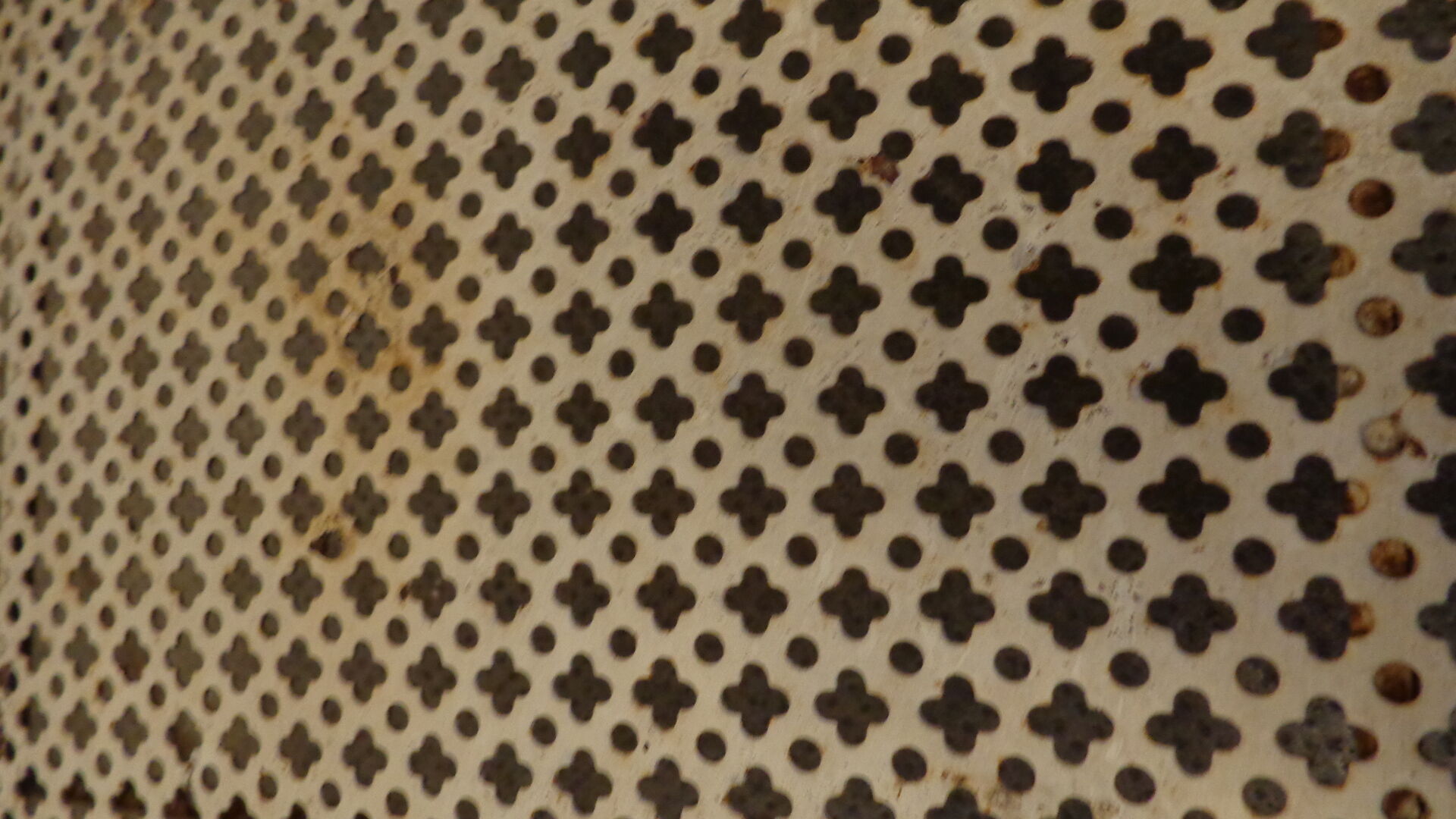 Vintage perforated metal shelf