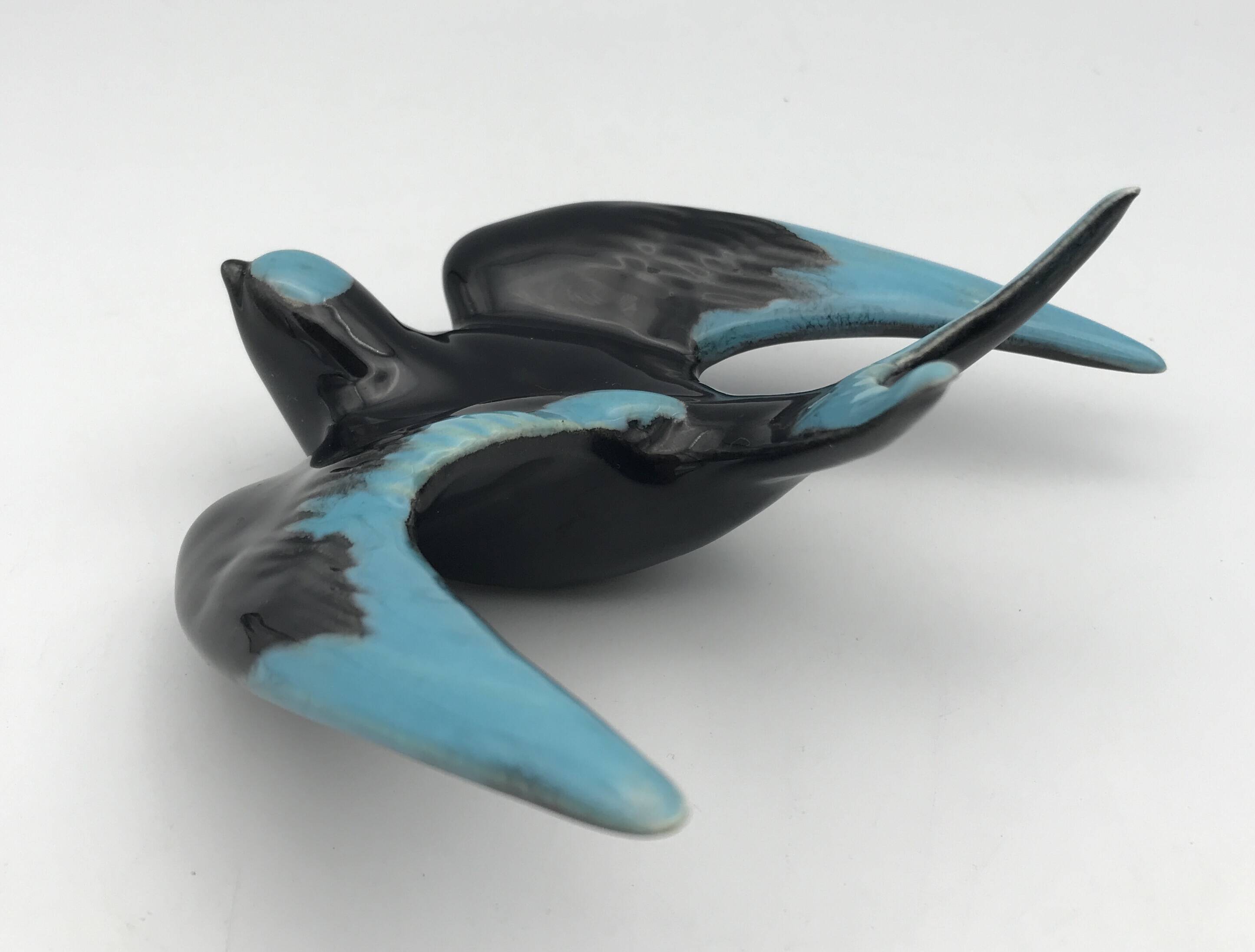 Vintage swallow in two-tone black and blue enameled ceramic
