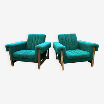 Duo of vintage armchairs with green fabrics.