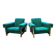 Duo de fauteuils vintage à tissus vert.