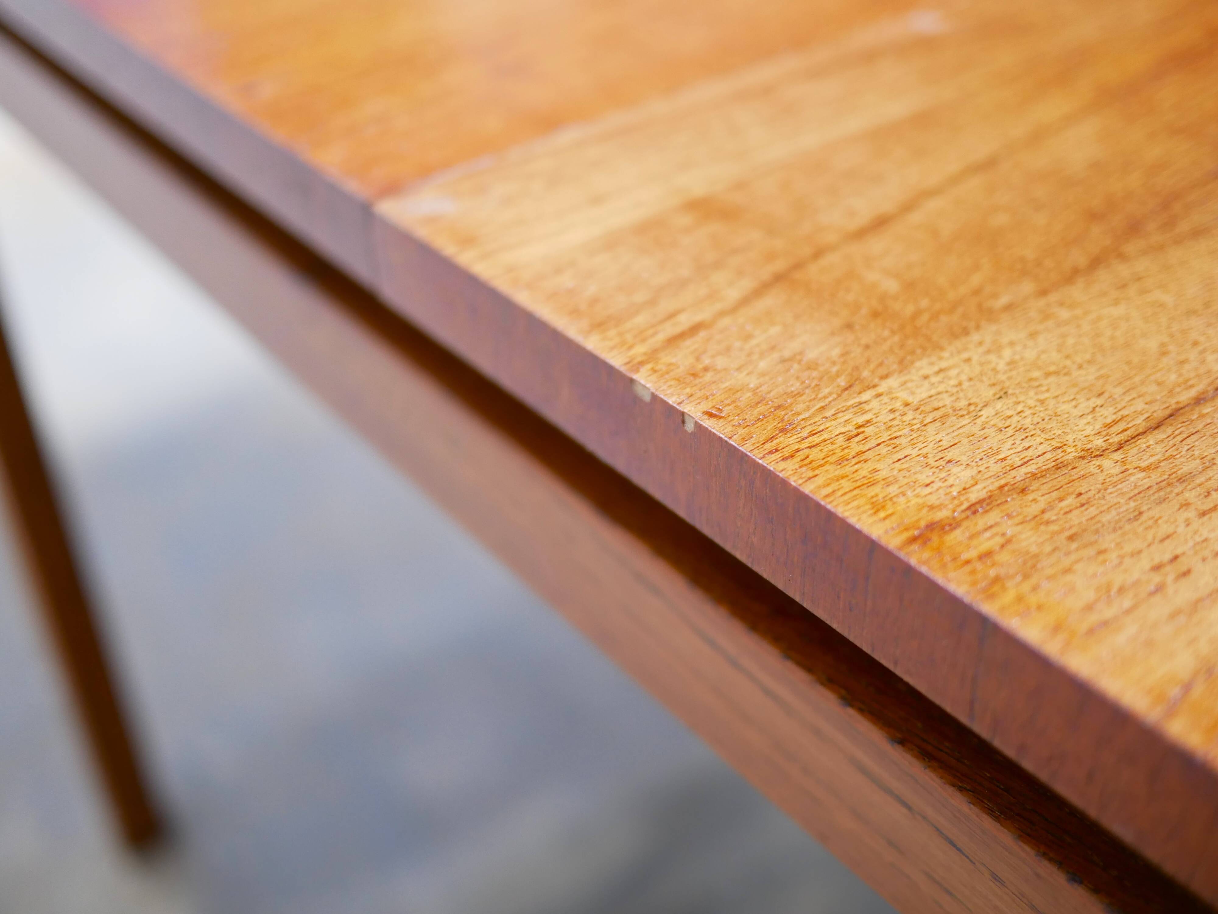 Extendable teak dining table by Gérard Guermonprez for Magnani editions