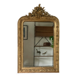 Golden fireplace mirror with pediment