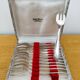 Set of 12 dessert/fish forks in silver-plated metal with hallmark.