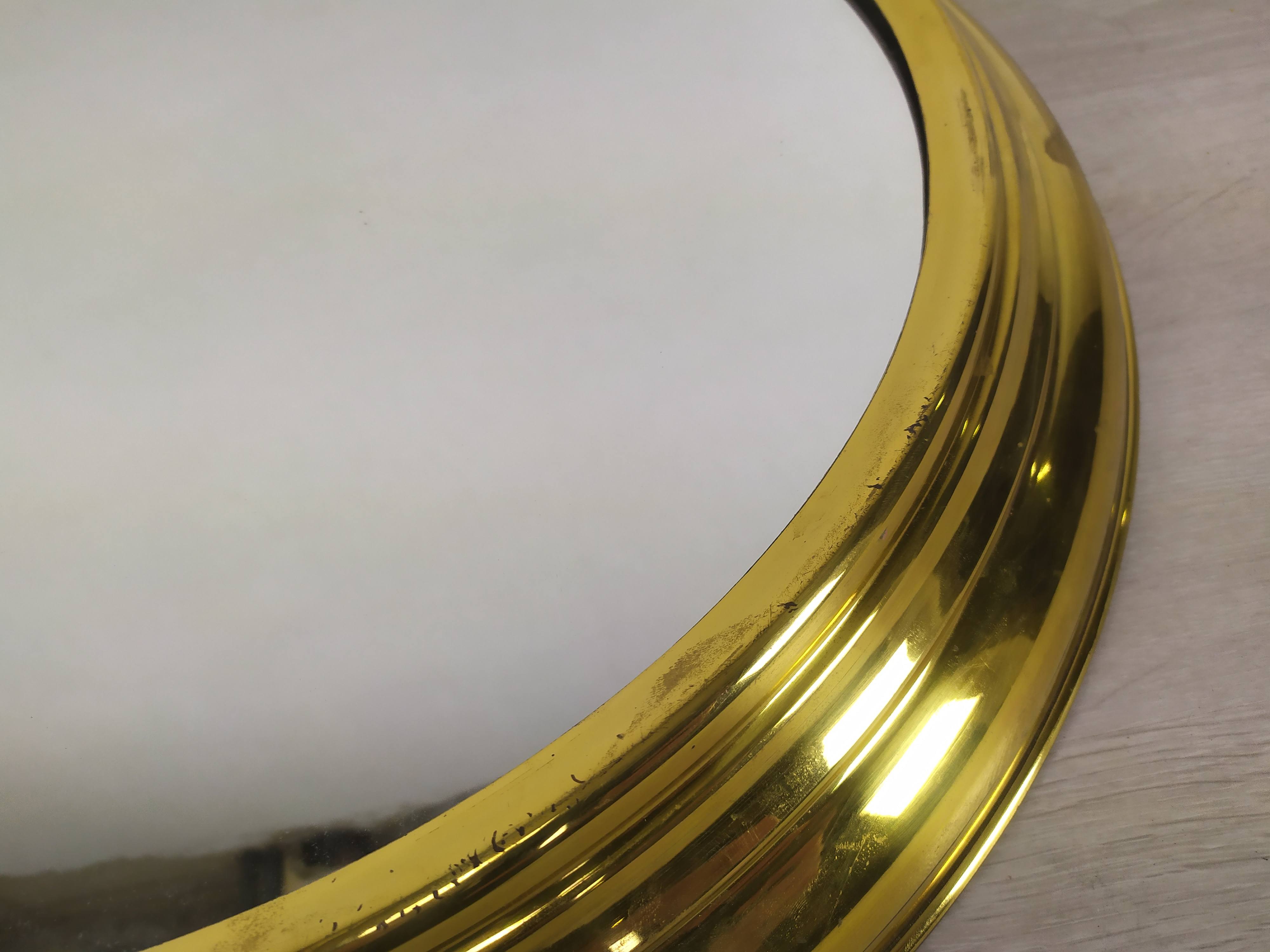 Golden brass mirror