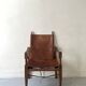Safari armchair in wood & cognac leather by Wilhelm Kienzle for Wohnbedarf 1950