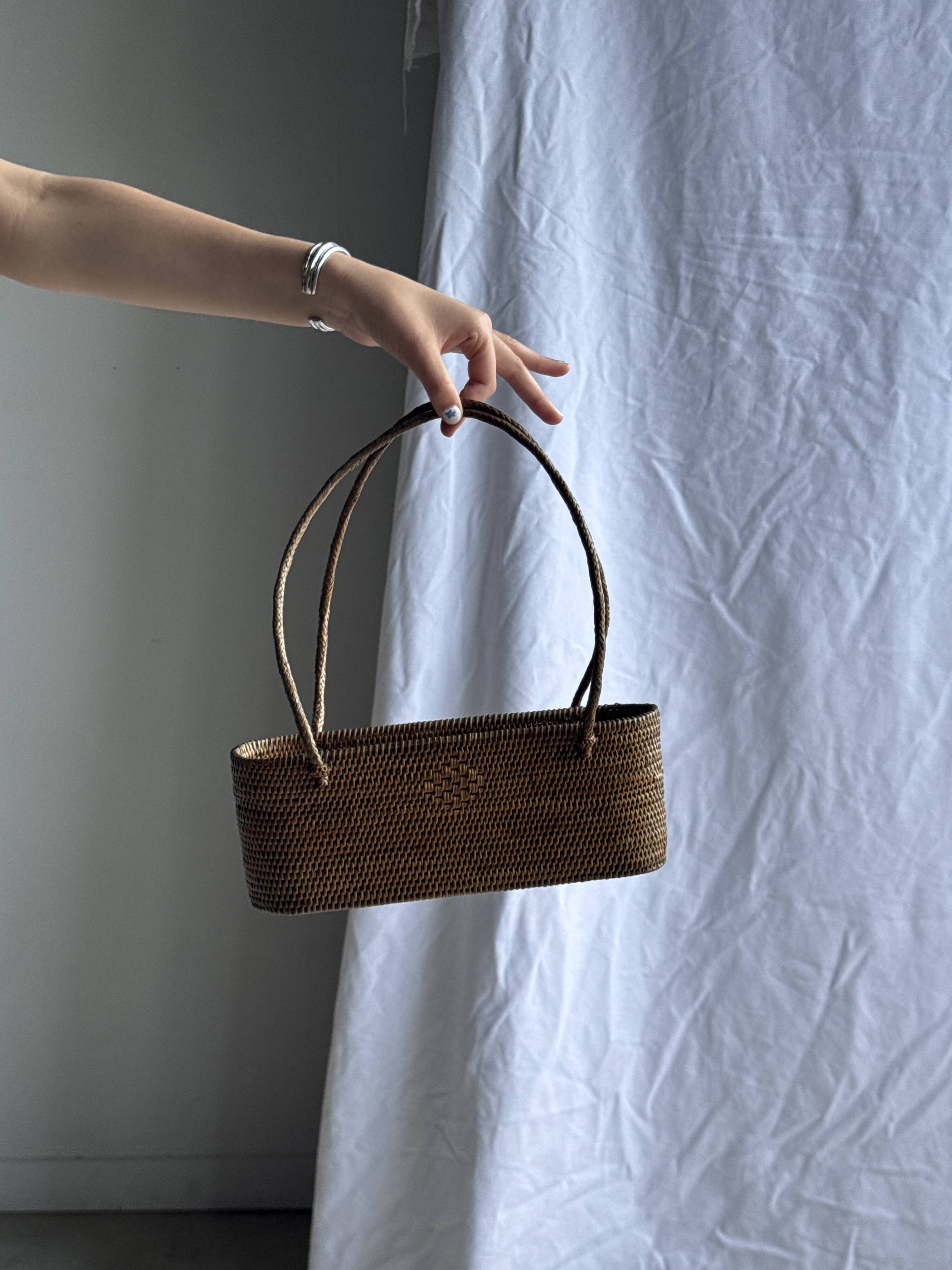 Small oval basket with long handles, traditional Indonesian L28xH10